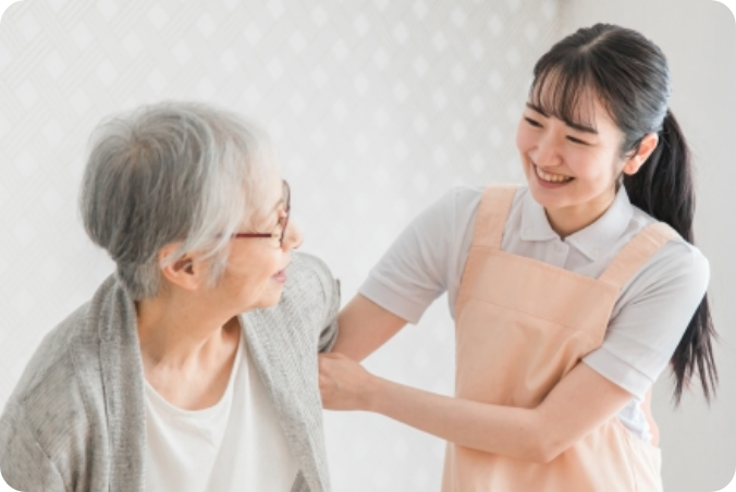 患者を支えている看護師