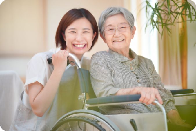 患者と看護師が明るい笑顔
